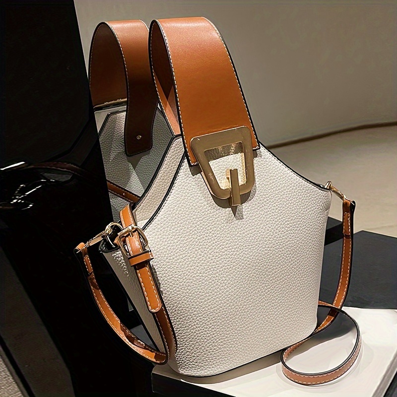 エレガントな白いペブルドバケットバッグ、ブラウンのアクセント - Luxury Bags White のレビューと価格